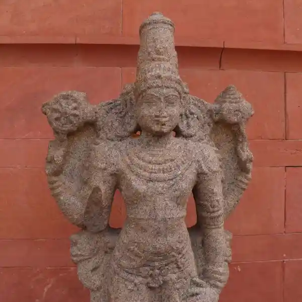Statue of Vishnu, preserver god, solar disc, eight-point